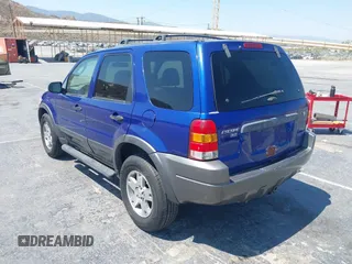 2005 Ford Escape XLT with VIN 1FMYU03155KB63374, listed as a IAAI auction lot 42739496 with 128,768 mi miles and . Bid and sale history available at DreamBid. Image 3.
