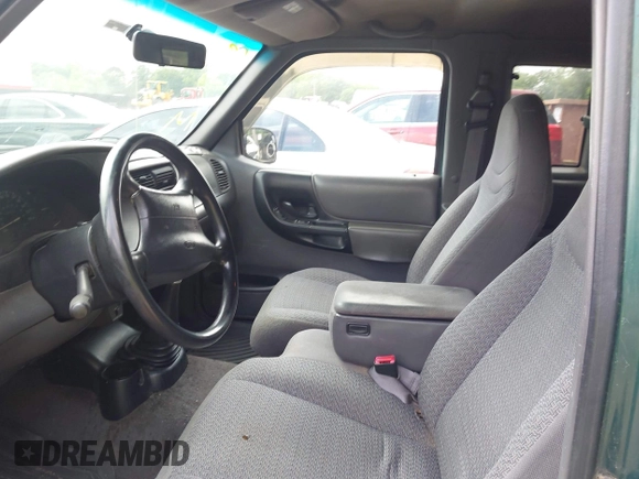 1999 Ford Ranger XL z VIN 1FTYR14VXXTA65855, wystawiony jako IAAI lot #42468004 z przebiegiem 209 632 mil mil oraz . Historia ofert i sprzedaży dostępna na DreamBid. Obrazek 5.