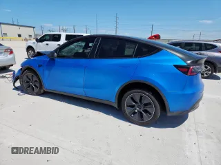 2024 Tesla Model Y Long Range z VIN 7SAYGDEE3RA238059, wystawiony jako Copart lot #61395925 z przebiegiem 14 991 mil mil oraz Szkoda całkowita • Salvage title. Historia ofert i sprzedaży dostępna na DreamBid. Obrazek 2.
