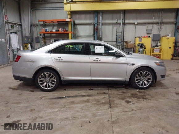 2013 Ford Taurus Limited with VIN 1FAHP2F83DG116657, listed as a IAAI auction lot 41533075 with 124,649 mi miles. Bid and sale history available at carsss.com. Image 13.