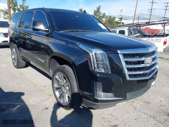 2015 Cadillac Escalade Luxury with VIN 1GYS4MKJ6FR685453, listed as a IAAI auction lot 41677545 with 149,131 mi miles. Bid and sale history available at carsss.com. Image 1.