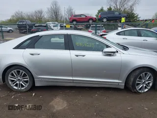 2013 Lincoln MKZ с VIN 3LN6L2GK0DR823324, выставлен на аукционе IAAI как лот 41954237 с пробегом 135 077 миль миль и . История ставок и продаж доступна на DreamBid. Изображение 13.