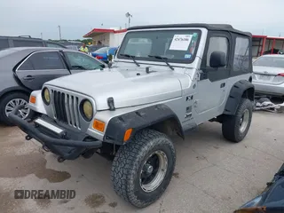 2005 Jeep Wrangler X z VIN 1J4FA39S95P370868, wystawiony jako IAAI lot #42476186 z przebiegiem 144 986 mil mil oraz . Historia ofert i sprzedaży dostępna na DreamBid. Obrazek 2.