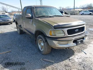 1997 Ford F-150 z VIN 1FTEX08L3VKD01079, wystawiony jako IAAI lot #41925310 z przebiegiem 203 938 mil mil oraz . Historia ofert i sprzedaży dostępna na DreamBid. Obrazek 1.