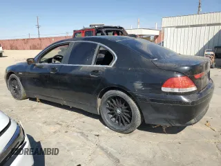 2002 BMW 7 Series 745i with VIN WBAGL634X2DP57617, listed as a Copart auction lot 74073604 with 153,666 mi miles and Clean Title. Bid and sale history available at DreamBid. Image 2.