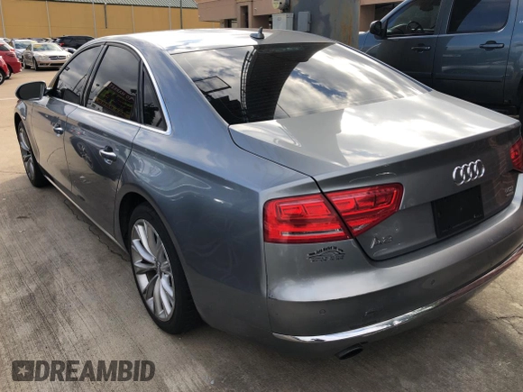 2012 Audi A8 с VIN WAUAVAFD2CN028862, выставлен на аукционе Copart как лот 80295204 с пробегом 162 752 миль миль и Чистый • Clean title. История ставок и продаж доступна на DreamBid. Изображение 3.
