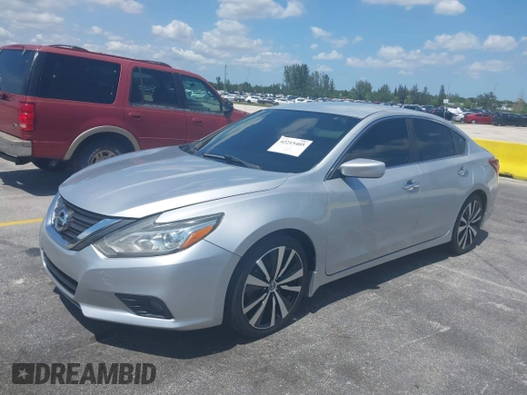 2017 Nissan Altima SV with VIN 1N4AL3AP2HC164553, listed as a IAAI auction lot 42215405 with 117,736 mi miles and . Bid and sale history available at DreamBid. Image 17.