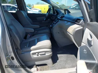 2012 Honda Odyssey Touring with VIN 5FNRL5H96CB043939, listed as a IAAI auction lot 41983643 with 202,535 mi miles. Bid and sale history available at carsss.com. Image 5.