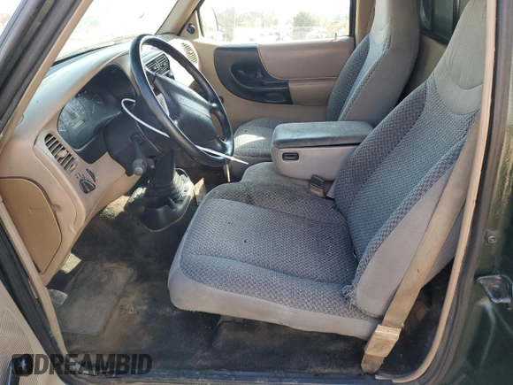 1997 Ford Ranger XLT with VIN 1FTCR10AXVPB26107, listed as a Copart auction lot 49113425 with 148,630 mi miles and Salvage Title. Bid and sale history available at DreamBid. Image 7.