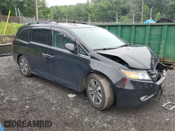 2016 Honda Odyssey Touring Elite with VIN 5FNRL5H90GB061827, listed as a Copart auction lot 61271695 with Not provided miles and Salvage title. Bid and sale history available at DreamBid. Image 4.