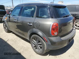 2014 MINI Countryman with VIN WMWZB3C54EWR39731, listed as a Copart auction lot 63635215 with 85,751 mi miles and Salvage title. Bid and sale history available at DreamBid. Image 2.