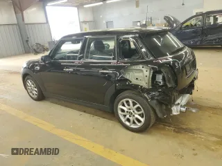 2021 MINI Hardtop 4 Door Oxford Edition with VIN WMWXU7C08M2N79978, listed as a Copart auction lot 61961105 with 29,714 mi miles and Salvage title. Bid and sale history available at DreamBid. Image 2.