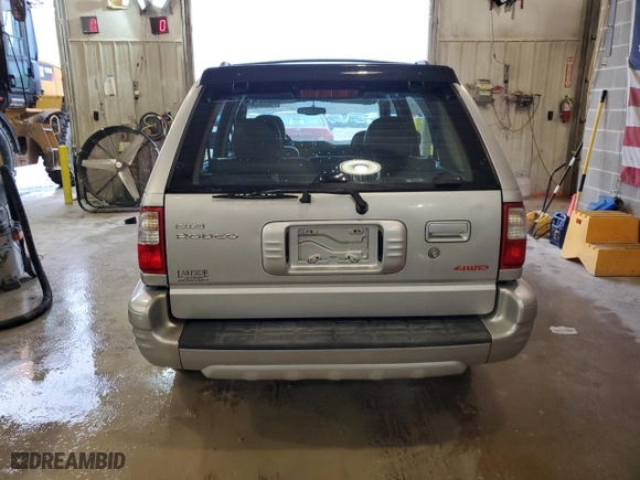 2000 Isuzu Rodeo with VIN 4S2DM58WXY4346884, listed as a Copart auction lot 43108675 with 144,306 mi miles and Non Repairable. Bid and sale history available at carsss.com. Image 6.