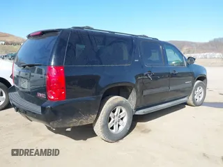 2014 GMC Yukon XL SLT with VIN 1GKS2KE79ER238831, listed as a IAAI auction lot 41767472 with 284,596 mi miles. Bid and sale history available at carsss.com. Image 4.