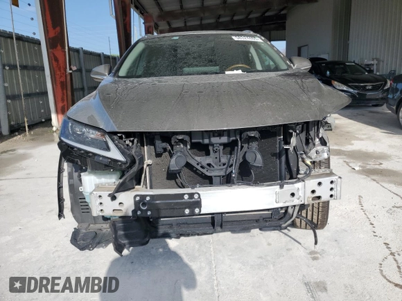 2020 Lexus RX 350L with VIN JTJHZKEA1L2015764, listed as a Copart auction lot 58324465 with 54,860 mi miles and Salvage title. Bid and sale history available at DreamBid. Image 5.
