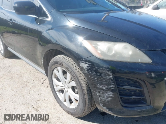 2011 Mazda CX-7 s Touring with VIN JM3ER4CL2B0382096, listed as a IAAI auction lot 41896555 with 177,646 mi miles. Bid and sale history available at carsss.com. Image 6.