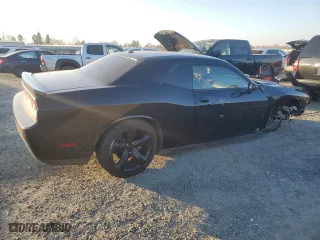 2013 Dodge Challenger SXT with VIN 2C3CDYAG3DH619905, listed as a Copart auction lot 41792435 with 121,516 mi miles and Salvage Title. Bid and sale history available at carsss.com. Image 3.