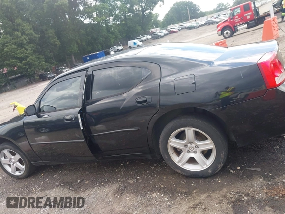 2010 Dodge Charger with VIN 2B3CK4CV0AH238001, listed as a IAAI auction lot 42449286 with 245,934 mi miles and . Bid and sale history available at DreamBid. Image 15.