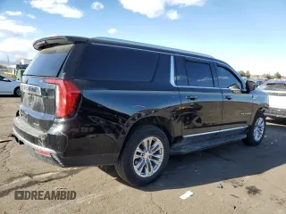 2021 GMC Yukon XL SLT with VIN 1GKS1GKD2MR243619, listed as a Copart auction lot 84262484 with 125,419 mi miles and Salvage Title. Bid and sale history available at carsss.com. Image 3.