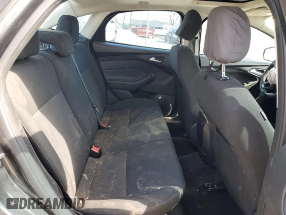 2015 Ford Focus SE z VIN 1FADP3F29FL340350, wystawiony jako Copart lot #53466455 z przebiegiem 146 374 mil mil oraz Szkoda całkowita • Salvage title. Historia ofert i sprzedaży dostępna na DreamBid. Obrazek 10.