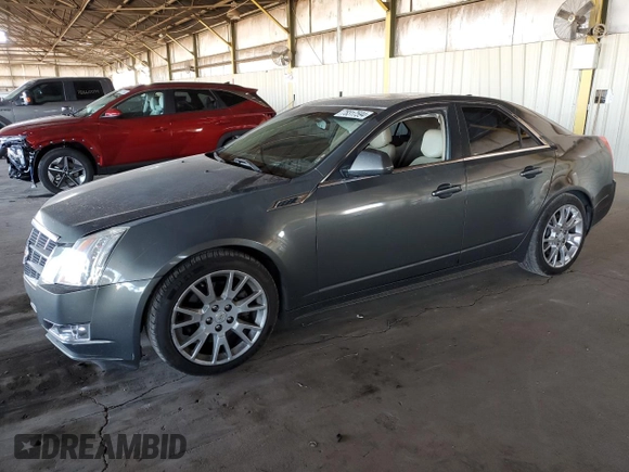 2011 Cadillac CTS Performance with VIN 1G6DJ5ED1B0146579, listed as a Copart auction lot 78317594 with 120,391 mi miles and Salvage Title. Bid and sale history available at DreamBid. Image 1.