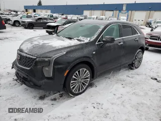 2024 Cadillac XT4 AWD Premium Luxury with VIN 1GYFZDR4XRF100138, listed as a Copart auction lot 42168785 with 8,997 mi miles and Salvage Title. Bid and sale history available at carsss.com. Image 1.