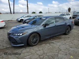 2019 Toyota Avalon Limited Hybrid z VIN 4T1B21FB3KU003922, wystawiony jako Copart lot #69477182 z przebiegiem 57 921 mil mil oraz . Historia ofert i sprzedaży dostępna na DreamBid. Obrazek 1.