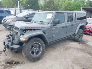 2021 Jeep Gladiator Rubicon with VIN 1C6JJTBG8ML619972, listed as a IAAI auction lot 42057805 with 37,875 mi miles and . Bid and sale history available at DreamBid. Image 18.