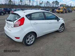 2016 Ford Fiesta SE with VIN 3FADP4EJ0GM147325, listed as a IAAI auction lot 42050497 with 63,349 mi miles and . Bid and sale history available at carsss.com. Image 4.