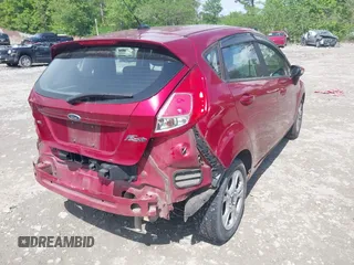 2016 Ford Fiesta SE z VIN 3FADP4EJ4GM178707, wystawiony jako IAAI lot #42095480 z przebiegiem 96 454 mil mil oraz . Historia ofert i sprzedaży dostępna na DreamBid. Obrazek 4.