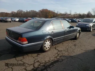 1996 Mercedes-Benz S with VIN WDBGA51E1TA301506, listed as a Copart auction lot 77976114 with 231,309 mi miles and Clean Title. Bid and sale history available at DreamBid. Image 3.