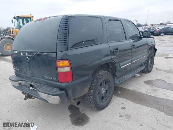 2003 Chevrolet Tahoe LS with VIN 1GNEC13V73R139530, listed as a IAAI auction lot 41598138 with 337,245 mi miles. Bid and sale history available at carsss.com. Image 4.
