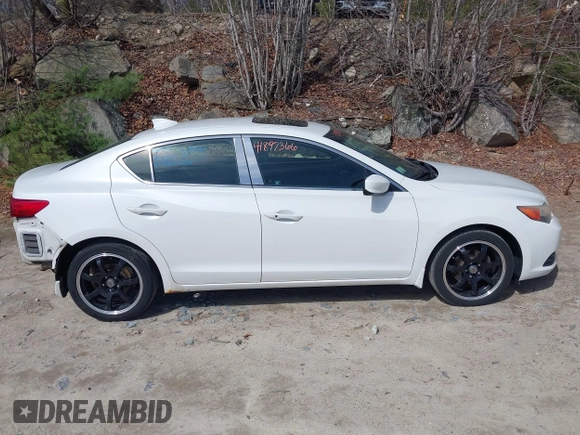 2013 Acura ILX Premium z VIN 19VDE1F53DE017389, wystawiony jako IAAI lot #41897366 z przebiegiem 161 556 mil mil oraz . Historia ofert i sprzedaży dostępna na DreamBid. Obrazek 14.