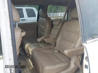 2007 Honda Odyssey EX-L with VIN 5FNRL38787B051582, listed as a IAAI auction lot 42104718 with 193,630 mi miles and . Bid and sale history available at DreamBid. Image 8.