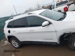 2016 Jeep Cherokee Latitude with VIN 1C4PJMCB3GW193834, listed as a IAAI auction lot 41675853 with 149,296 mi miles. Bid and sale history available at carsss.com. Image 13.