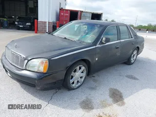 2002 Cadillac DeVille DHS z VIN 1G6KE57Y62U233642, wystawiony jako IAAI lot #42132517 z przebiegiem 223 505 mil mil oraz . Historia ofert i sprzedaży dostępna na DreamBid. Obrazek 2.
