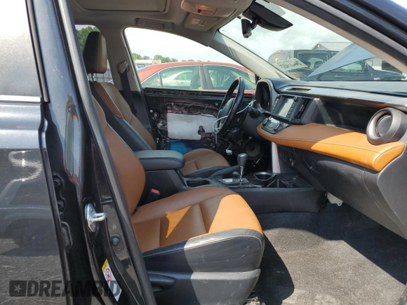 2016 Toyota RAV4 Limited с VIN JTMDJREV4GD021010, выставлен на аукционе Copart как лот 64437465 с пробегом 165 044 миль миль и Списание • Salvage title. История ставок и продаж доступна на DreamBid. Изображение 7.