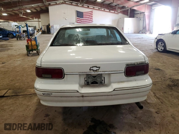 1996 Chevrolet Caprice 1SA Special Value z VIN 1G1BL52W3TR164138, wystawiony jako Copart lot #51371145 z przebiegiem 217 857 mil mil oraz Czysty tytuł • Clean title. Historia ofert i sprzedaży dostępna na DreamBid. Obrazek 6.