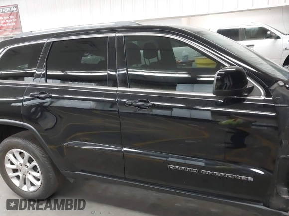 2021 Jeep Grand Cherokee Laredo E z VIN 1C4RJEAG7MC738928, wystawiony jako IAAI lot #42708702 z przebiegiem 63 329 mil mil oraz . Historia ofert i sprzedaży dostępna na DreamBid. Obrazek 13.