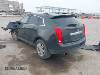 2016 Cadillac SRX Luxury Collection with VIN 3GYFNBE34GS522735, listed as a IAAI auction lot 42416899 with 142,561 mi miles and . Bid and sale history available at DreamBid. Image 3.