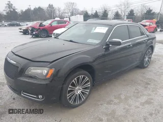 2013 Chrysler 300 with VIN 2C3CCABT7DH652797, listed as a IAAI auction lot 41602405 with 203,920 mi miles. Bid and sale history available at carsss.com. Image 17.