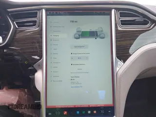 2016 Tesla Model S 90D with VIN 5YJSA1E21GF121962, listed as a IAAI auction lot 42130291 with 114,670 mi miles and . Bid and sale history available at DreamBid. Image 19.