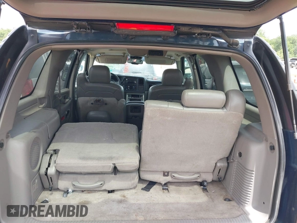2005 Chevrolet Tahoe Z71 with VIN 1GNEC13T35R205945, listed as a IAAI auction lot 42584823 with 183,432 mi miles and . Bid and sale history available at DreamBid. Image 12.