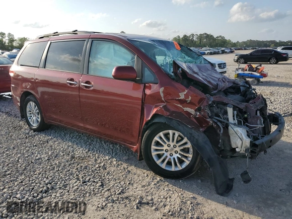 2012 Toyota Sienna XLE AAS with VIN 5TDYK3DC8CS192241, listed as a Copart auction lot 50985055 with Not provided miles and Salvage title. Bid and sale history available at DreamBid. Image 4.