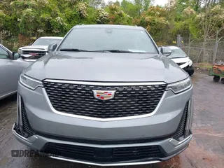 2024 Cadillac XT6 FWD Premium Luxury with VIN 1GYKPCRS0RZ748048, listed as a IAAI auction lot 42043117 with 7,232 mi miles. Bid and sale history available at carsss.com. Image 12.