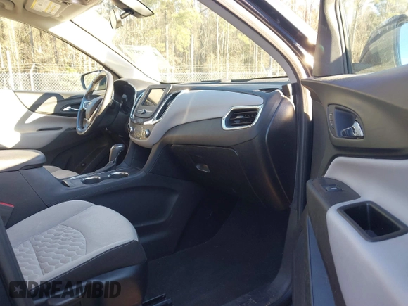 2019 Chevrolet Equinox LT z VIN 3GNAXKEVXKL243487, wystawiony jako IAAI lot #41217077 z przebiegiem 62 119 mil mil oraz . Historia ofert i sprzedaży dostępna na DreamBid. Obrazek 5.