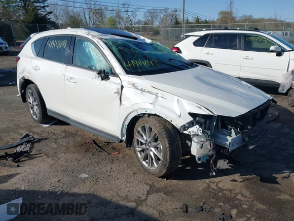 2020 Mazda CX-5 Grand Touring with VIN JM3KFBDM6L0751471, listed as a IAAI auction lot 41914849 with Not Provided miles and . Bid and sale history available at carsss.com. Image 1.