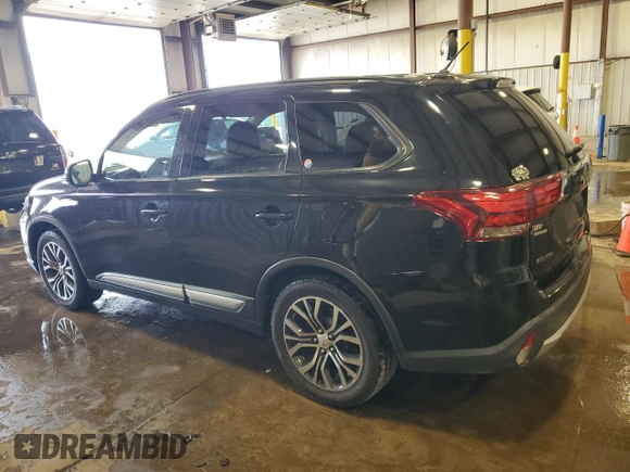 2016 Mitsubishi Outlander SE with VIN JA4AD3A36GZ008543, listed as a Copart auction lot 64110315 with 190,865 mi miles and Salvage title. Bid and sale history available at DreamBid. Image 2.