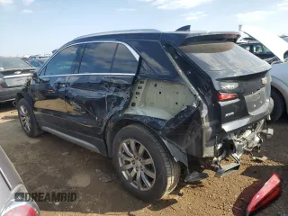 2019 Cadillac XT4 AWD Premium Luxury with VIN 1GYFZDR4XKF170289, listed as a Copart auction lot 52112025 with 100,524 mi miles and Salvage Title. Bid and sale history available at carsss.com. Image 2.