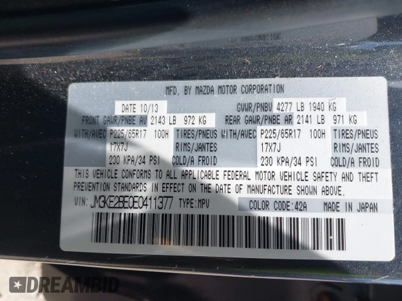 2014 Mazda CX-5 Sport with VIN JM3KE2BE0E0411377, listed as a IAAI auction lot 42143229 with 137,384 mi miles and . Bid and sale history available at carsss.com. Image 9.